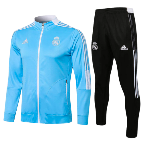 KIT GIACCA CELESTENERO A ZIP + TUTA REAL MADRID 2021